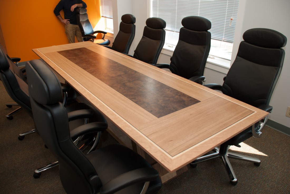 Conference table with wood inlay in middle